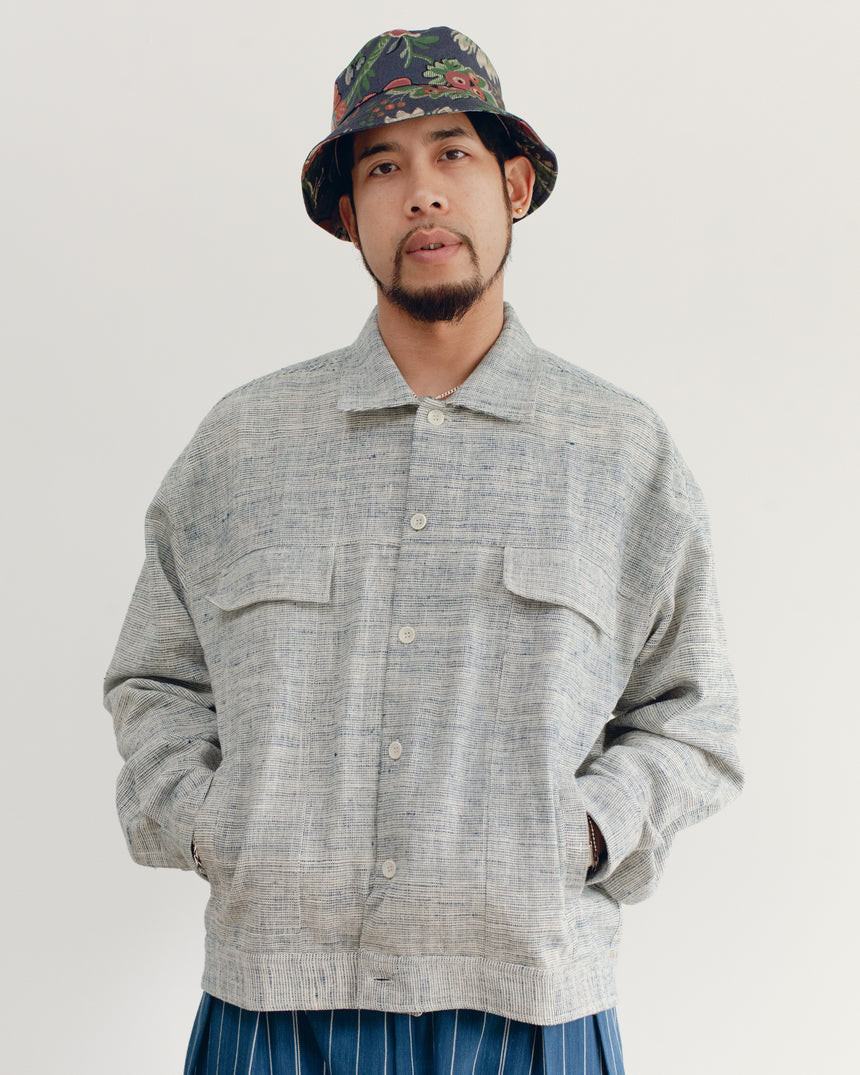 CHAMBRAY CRAFTED STATEMENT TRUCKER JACKET